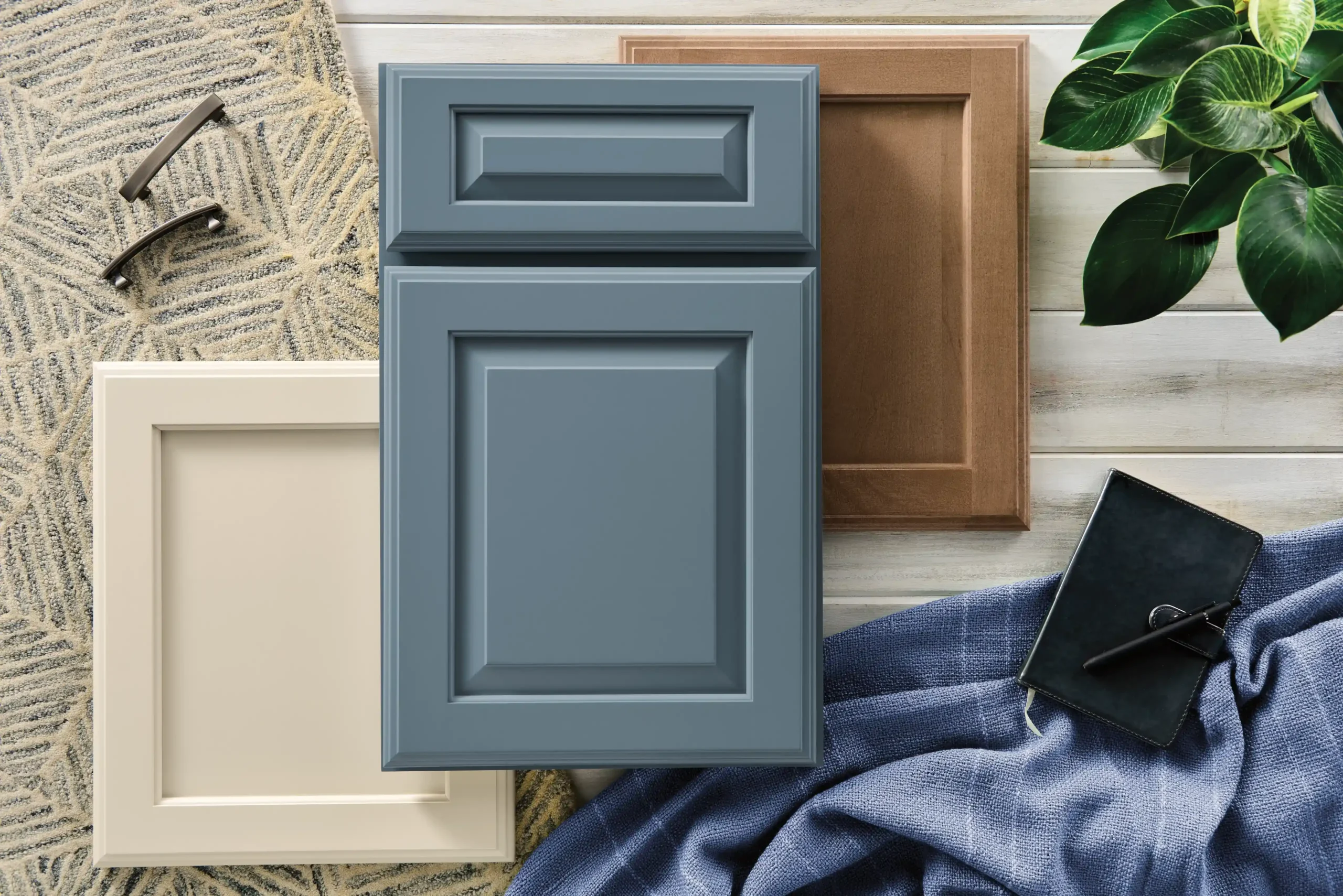 MD_Hydrangea_2025_MB12_11zon_11zon (Gold) Brookhill Raised Panel in Hydrangea, Flat Panel in Irish Crème, and Reverse Raised Panel in Biscotti all on maple